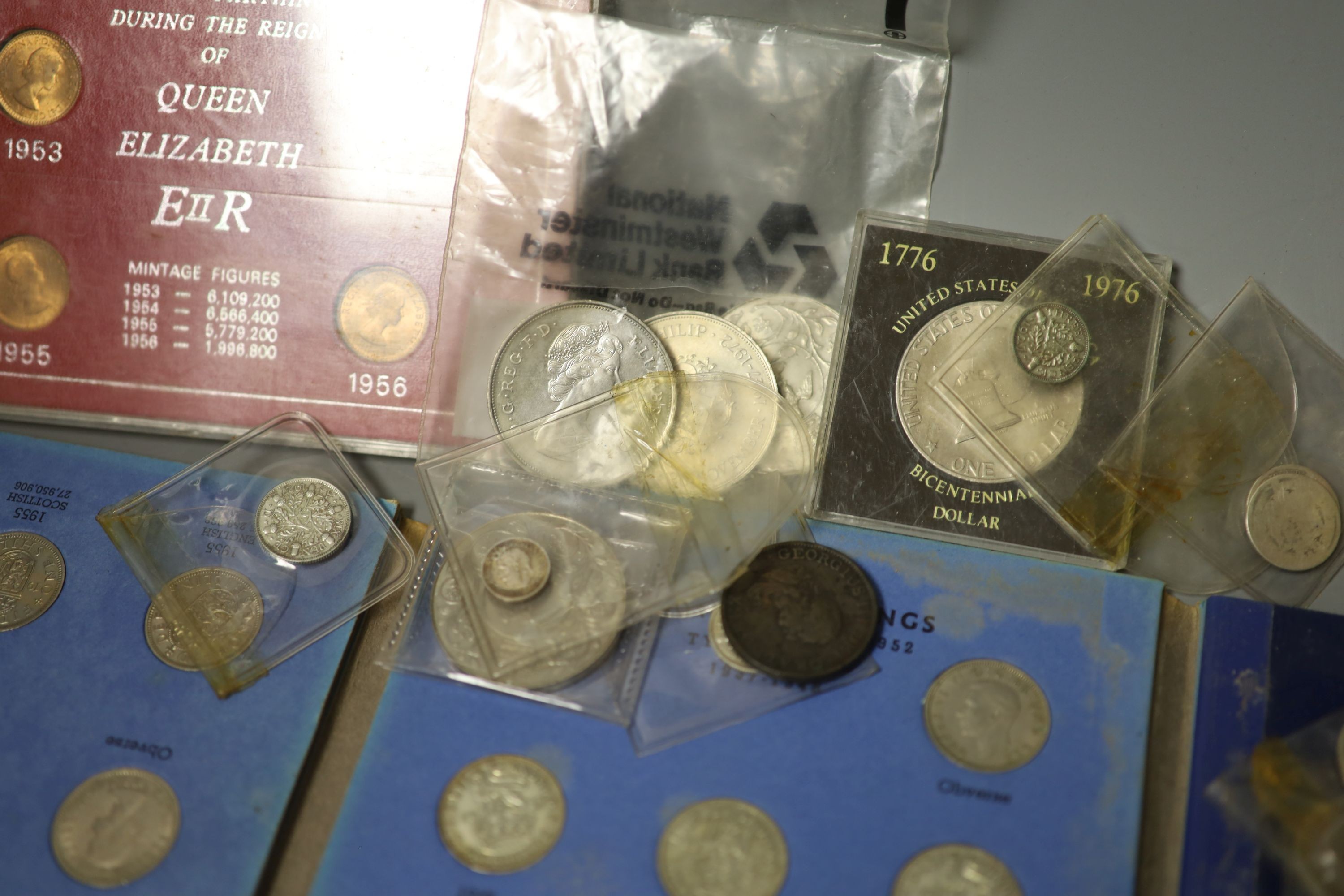A collection of Queen Elizabeth II coin year sets, 1970-1976, a George V 1928 part maundy set, 1d, 2d and 4d, various Crowns, threepences etc.